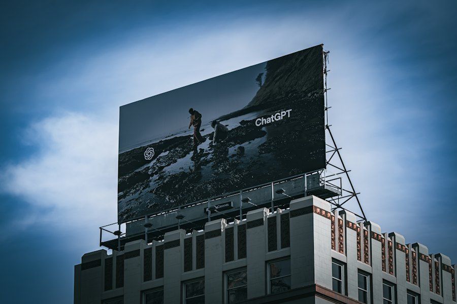 A digital billboard on top of a city building